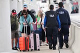 Face scans are replacing passports at U.S. airports. Here's who can — and can't — opt out.