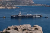 Trump shifts aircraft carrier and US focus away from Asia | AP News